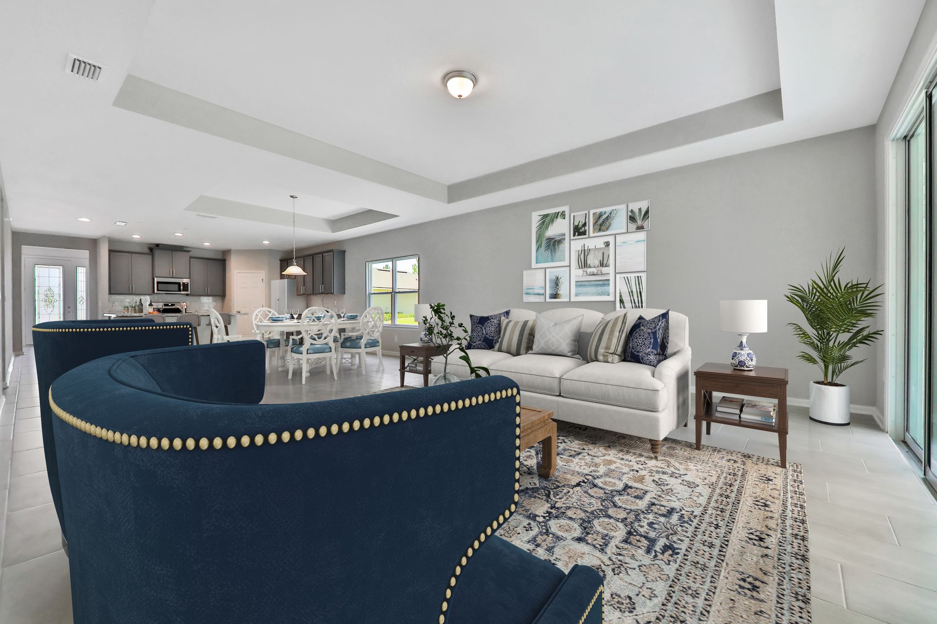 A living room with a couch , chairs , and a rug.