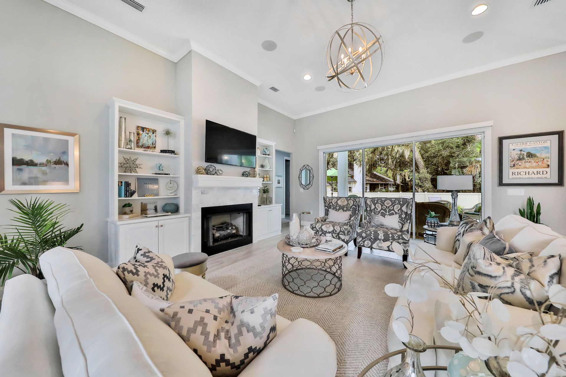 A living room filled with furniture and a fireplace
