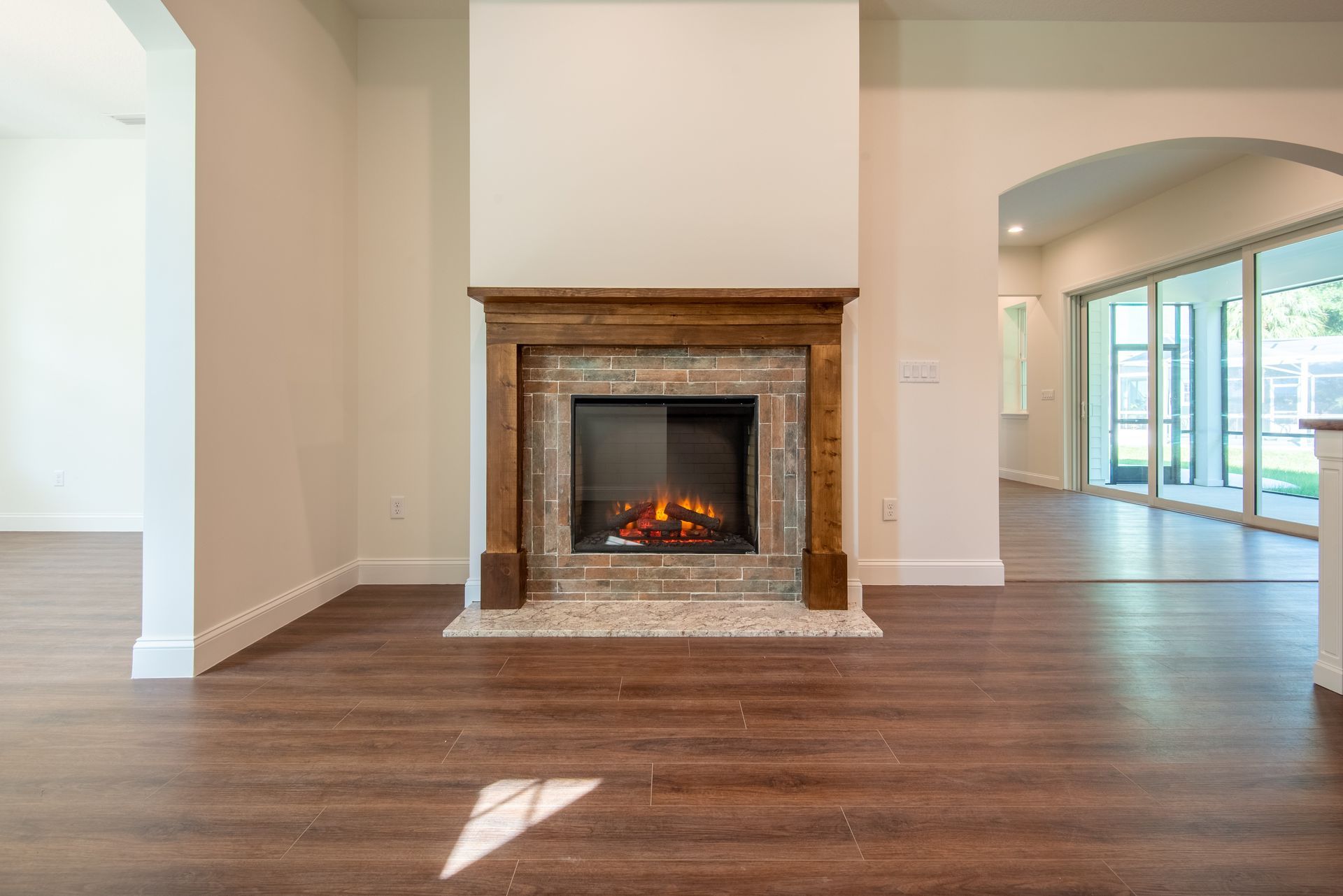 There is a fireplace in the middle of the room.