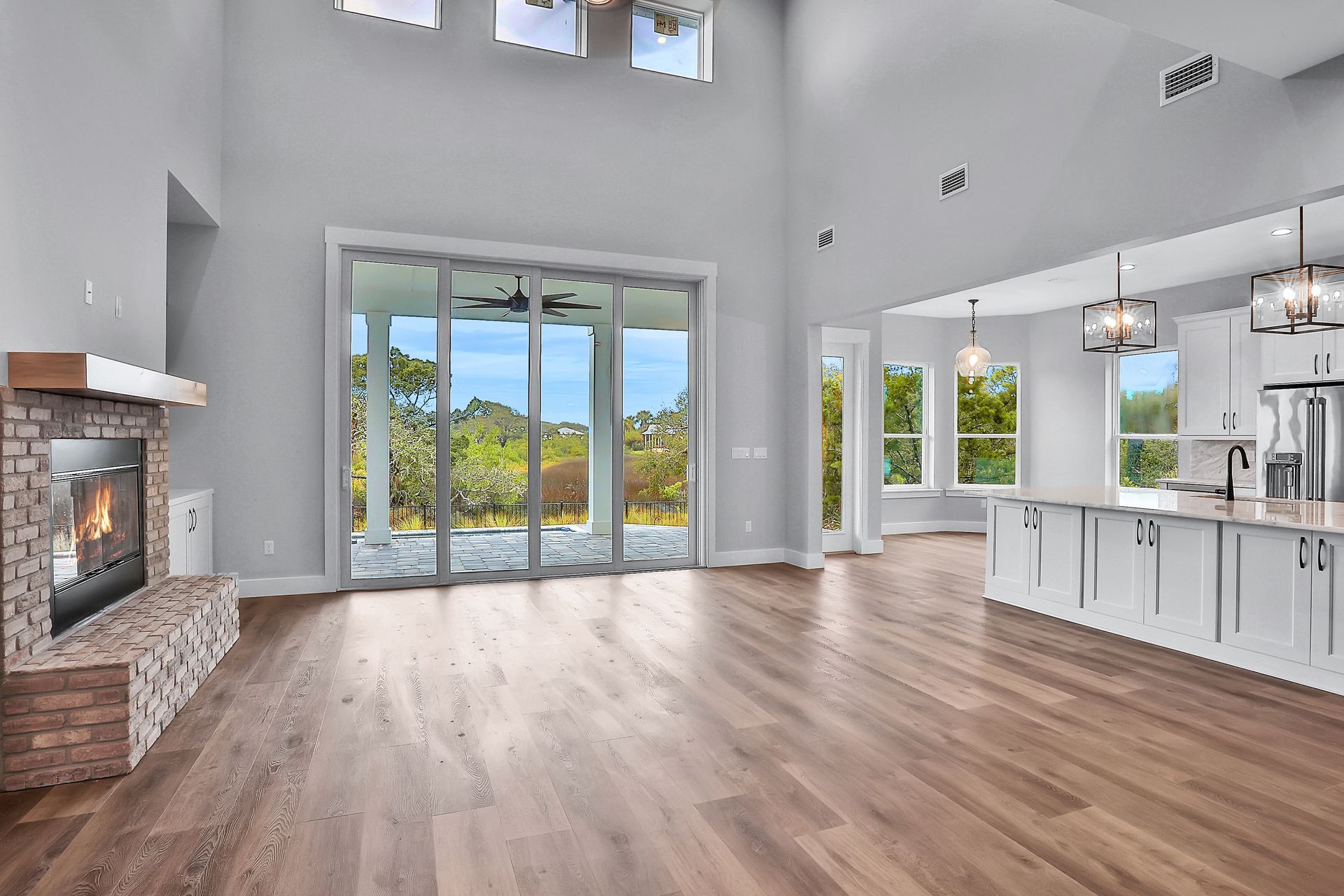 There is a fireplace in the middle of the living room.