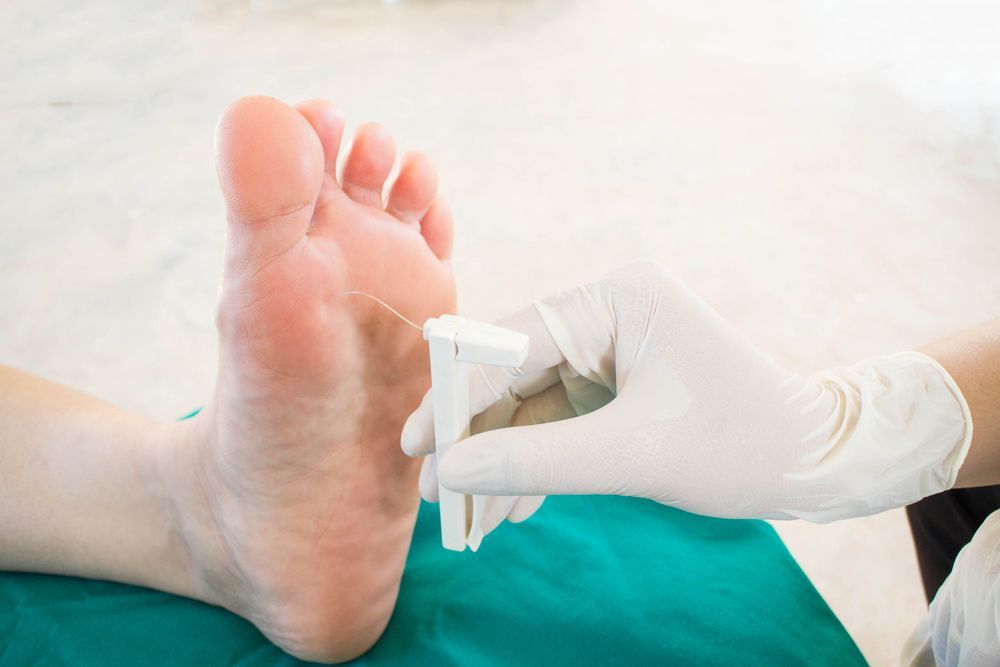 A Close Up Of A Person's Foot Being Examined By A Doctor — Sandy Gugenberger Podiatrist in Port Macquarie, NSW