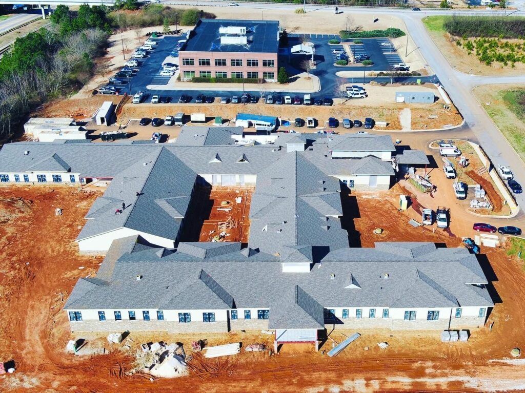 An aerial view of a large building under construction