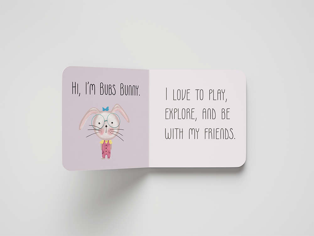 Open book with bunny drawing and text