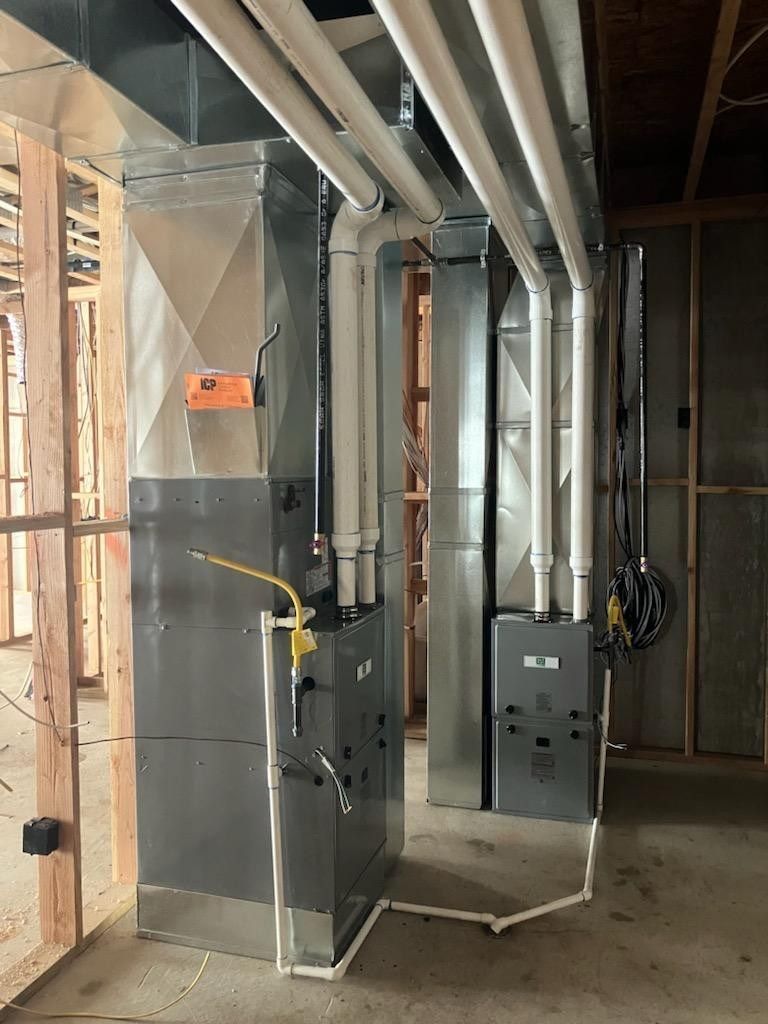 A room with a lot of pipes going through it