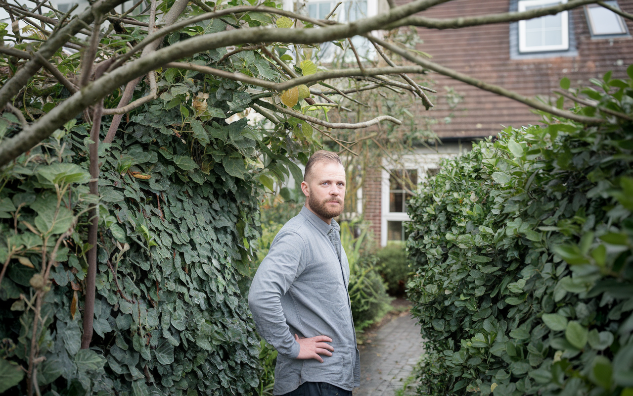 Canterbury+Home+owner+inspecting+their+overgrown+hedge and trees 
