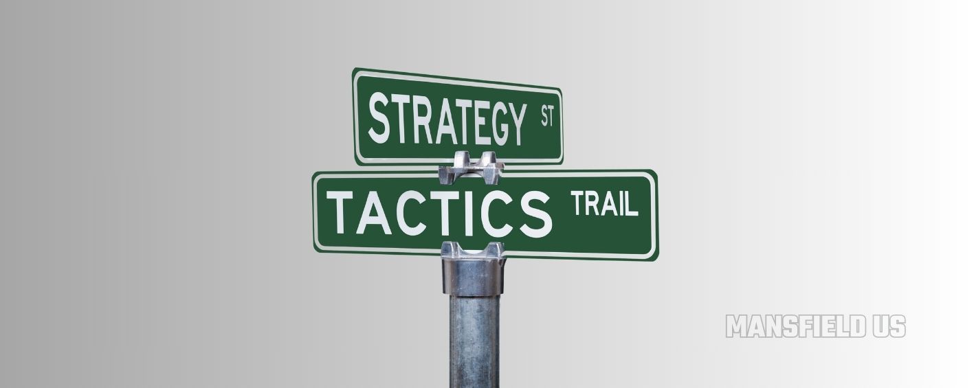 a street sign that says strategy tactics trail