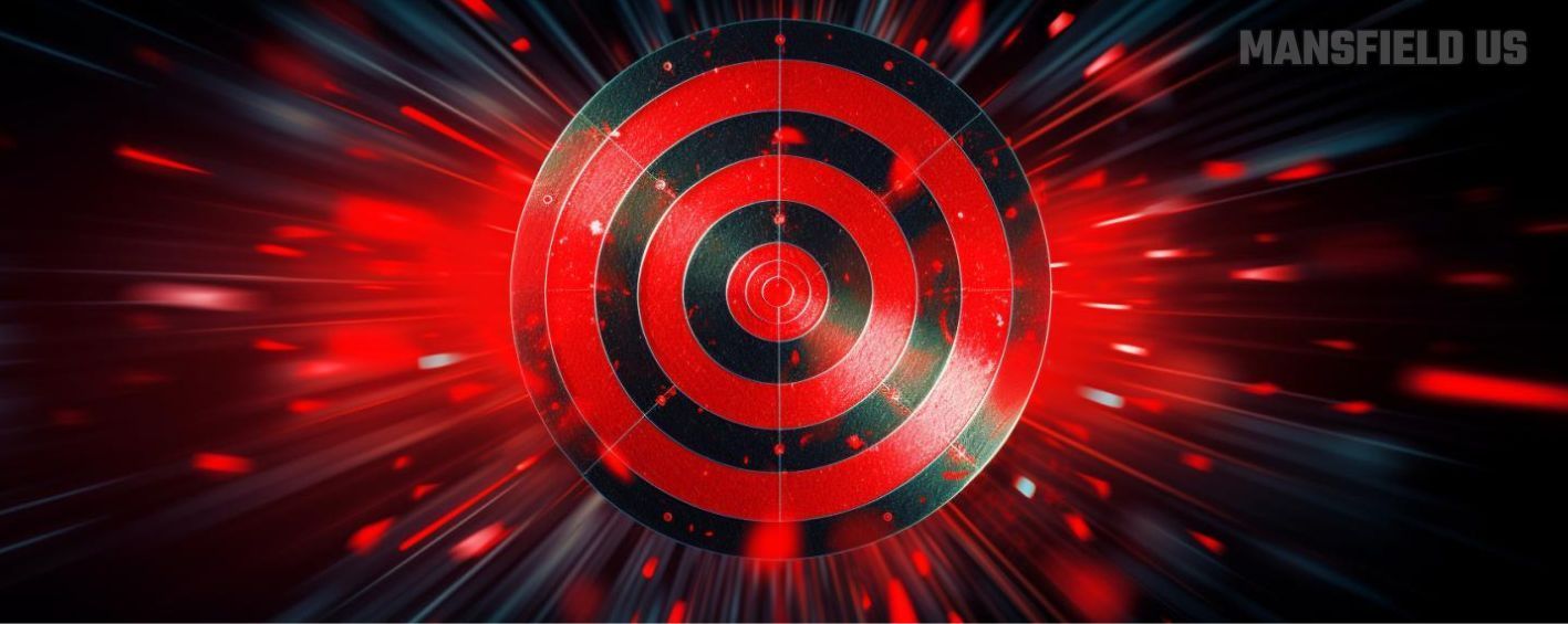 a red and black target is surrounded by red lights .