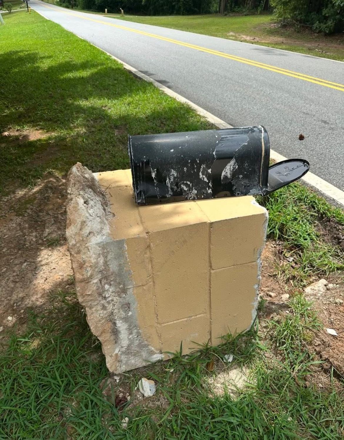 mailbox destroyed by vehicle