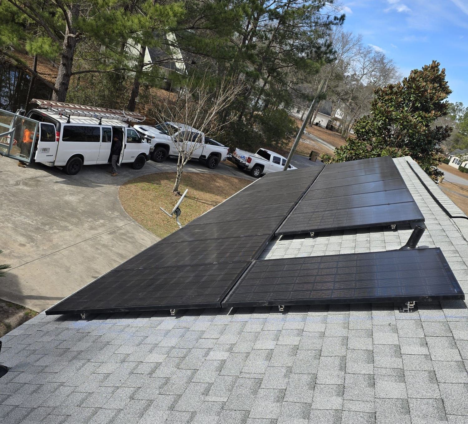 Row of Solar Panels in a Grassy Field — Savannah, GA — 1 Construction Kings LLC