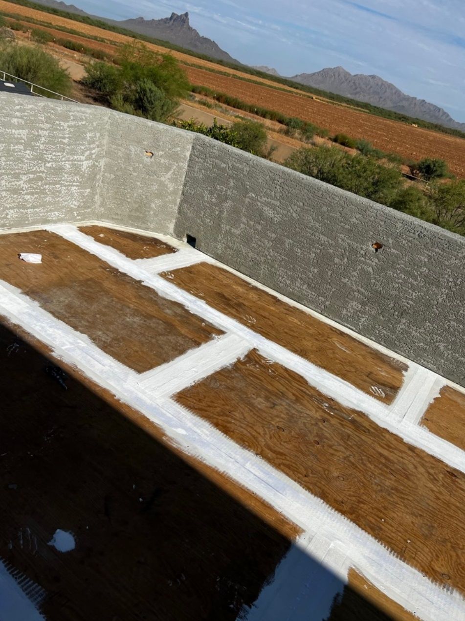 A white line is painted on a brown surface