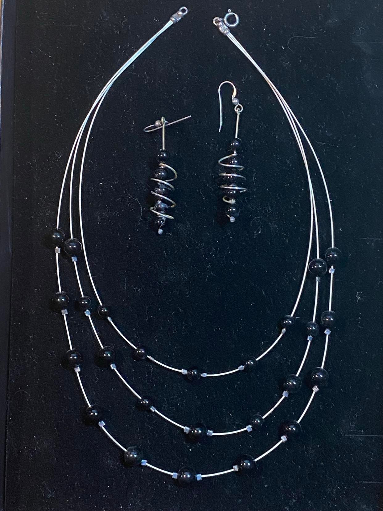 Onyx triple necklace with spiral earrings using Flex-Rite 49 Stirling Silver plated jewellery wire.