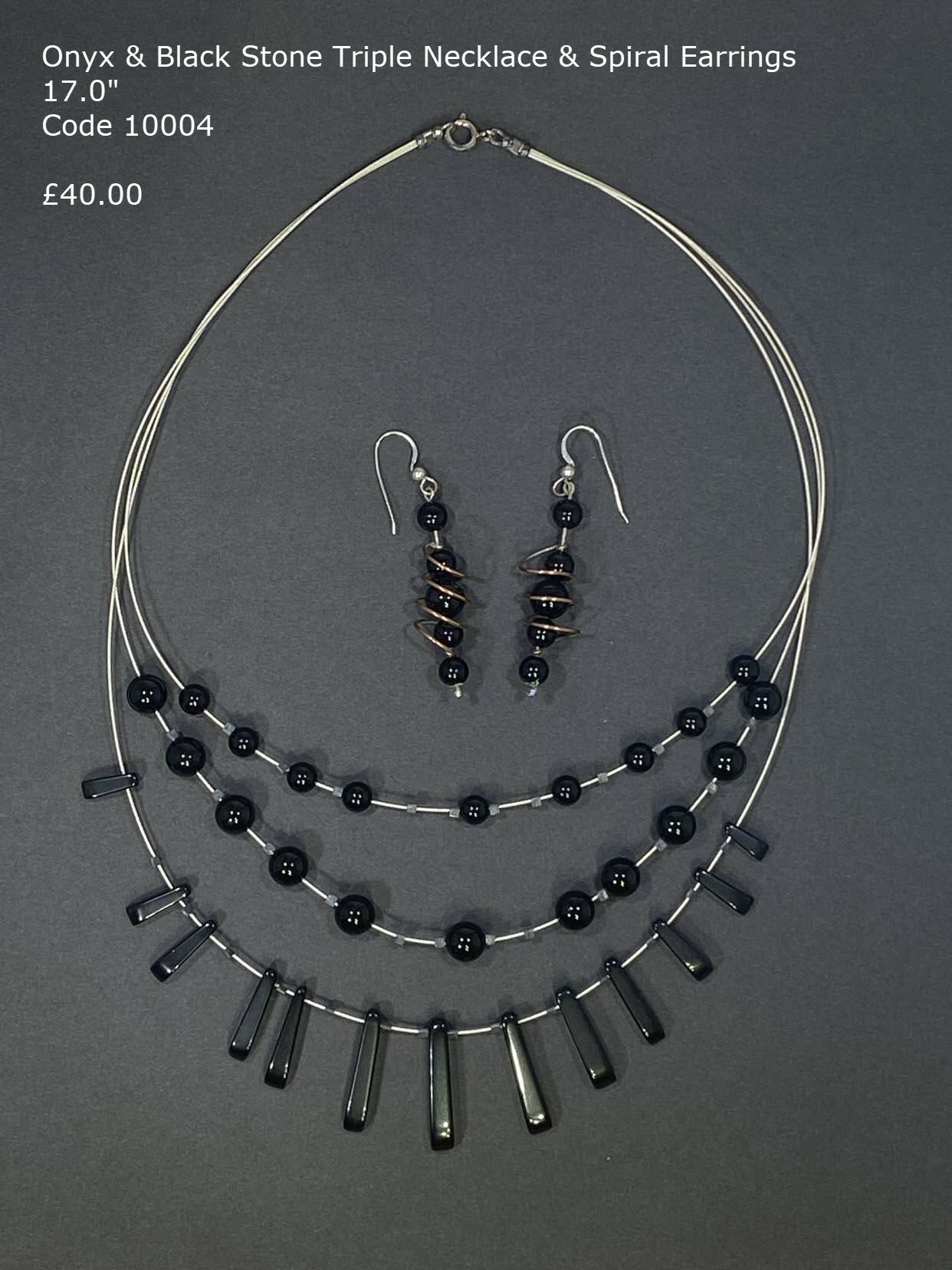 Onyx and Blackstone triple tapered necklace with spiral earrings.