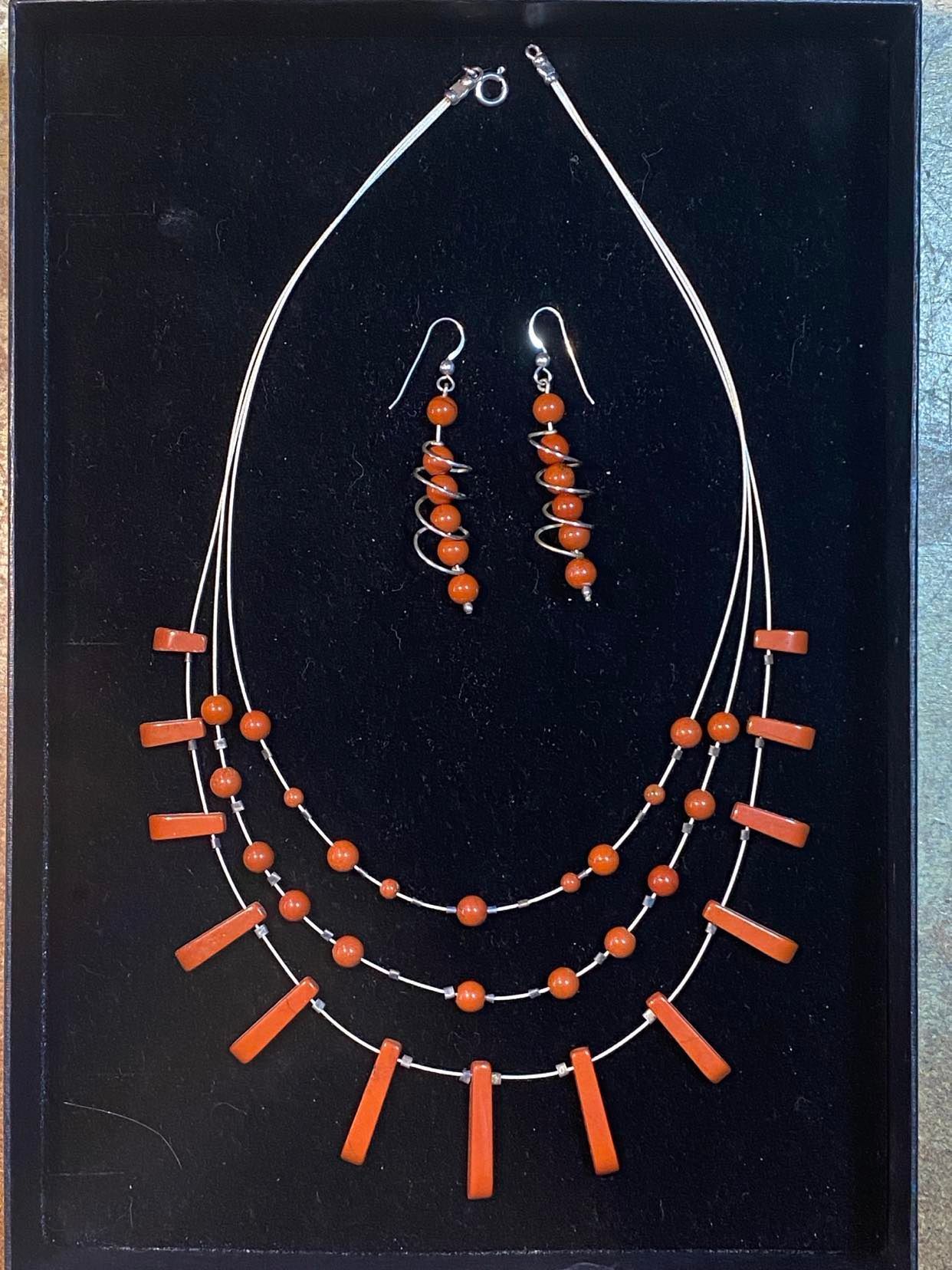 Red Jasper triple tapered necklace with spiral earrings.