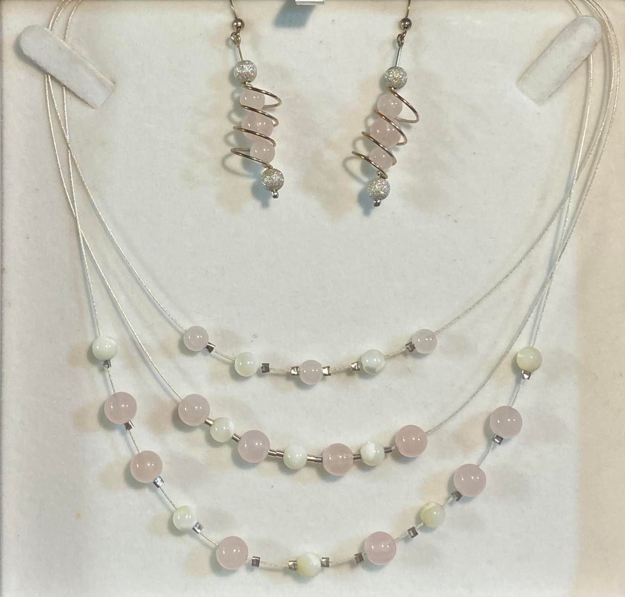 Rose Quartz and Mother of Pearl triple necklace with spiral earrings.