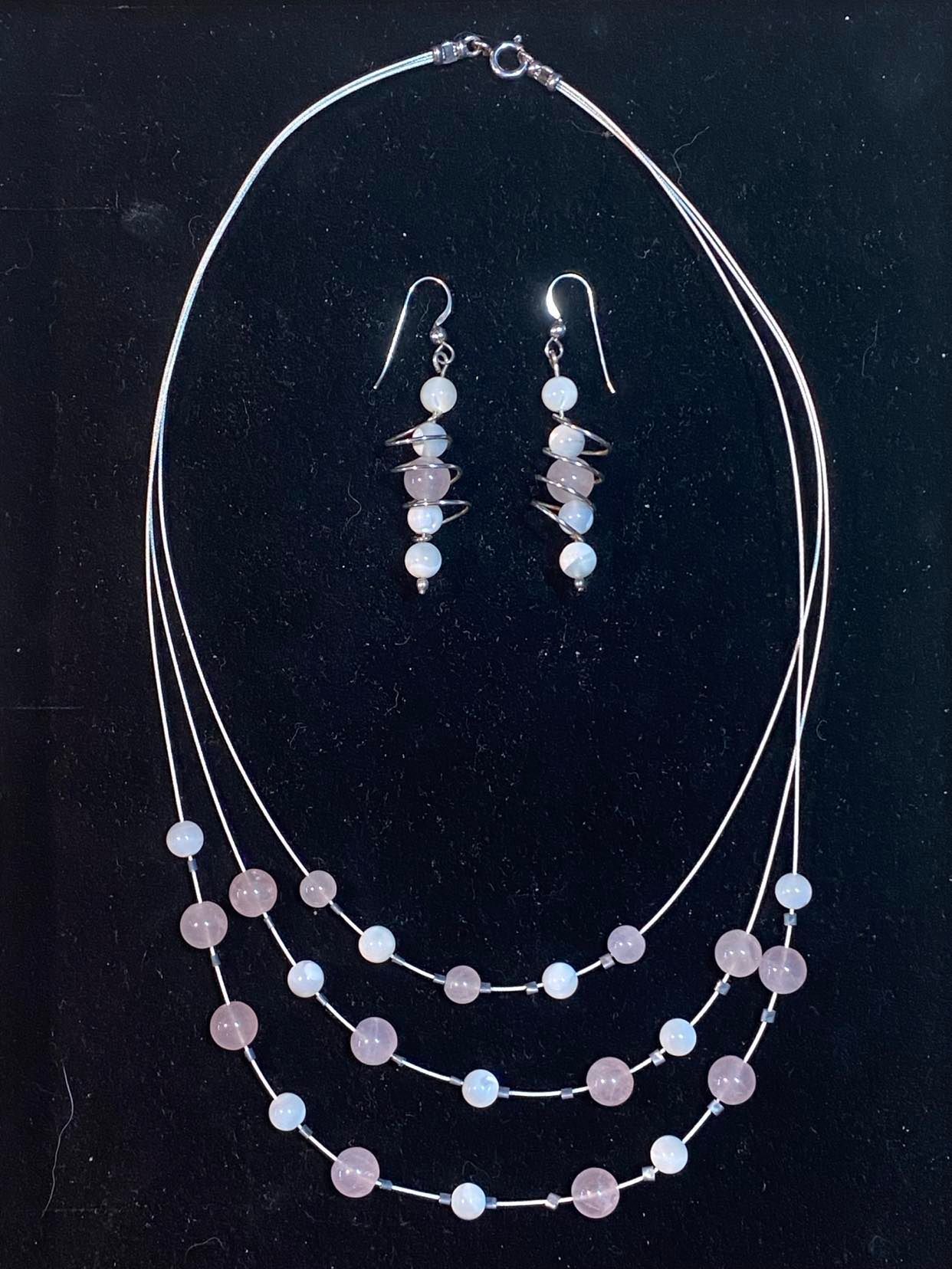 Rose Quartz and Mother of Pearl triple necklace with spiral earrings.