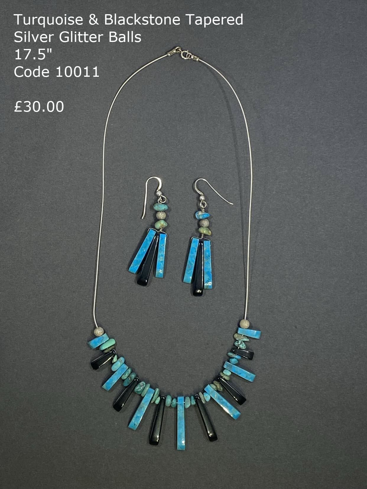 Turquoise and black stone necklace with spiral earrings.