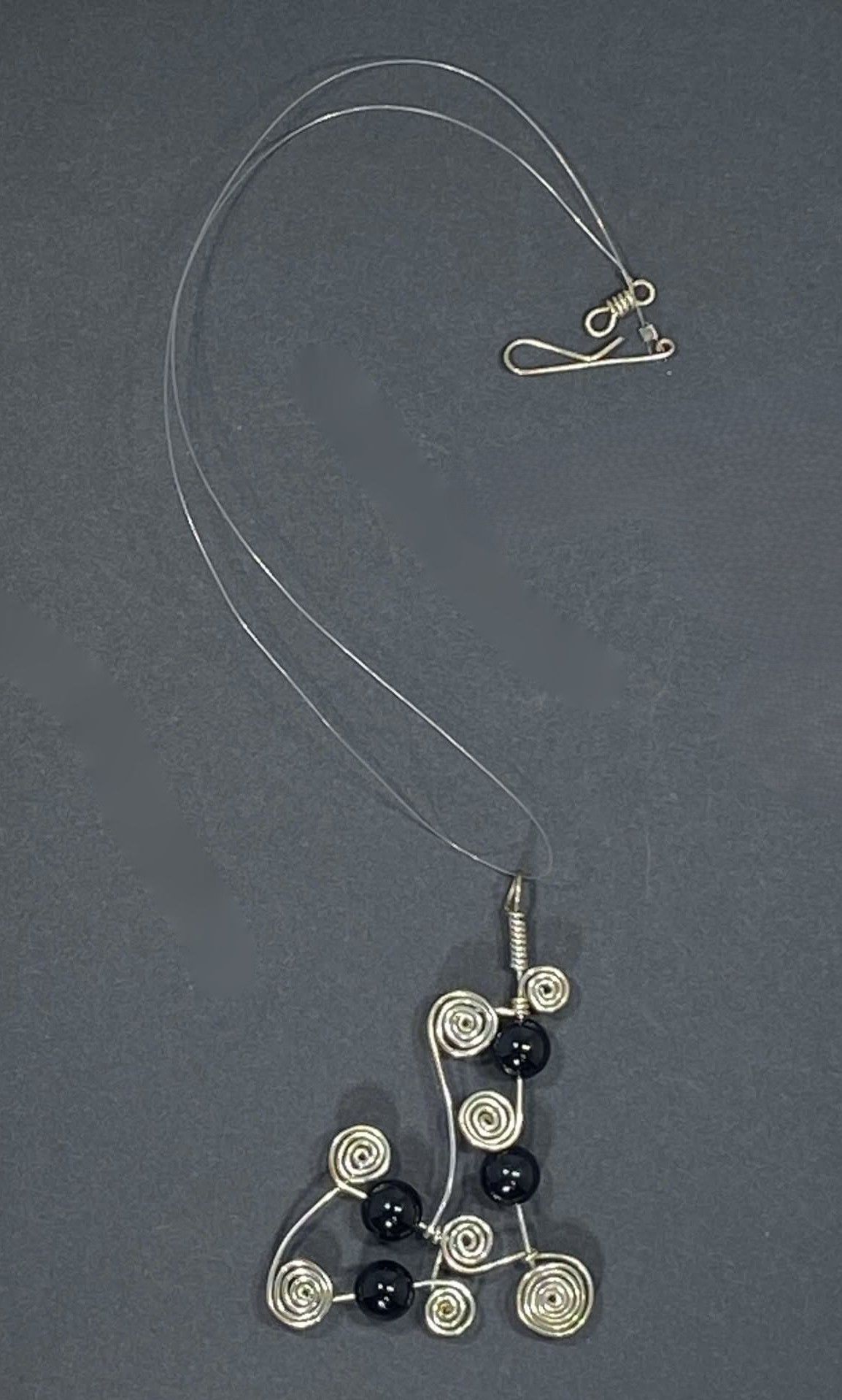 Nordic design with Onyx on illusion cord.