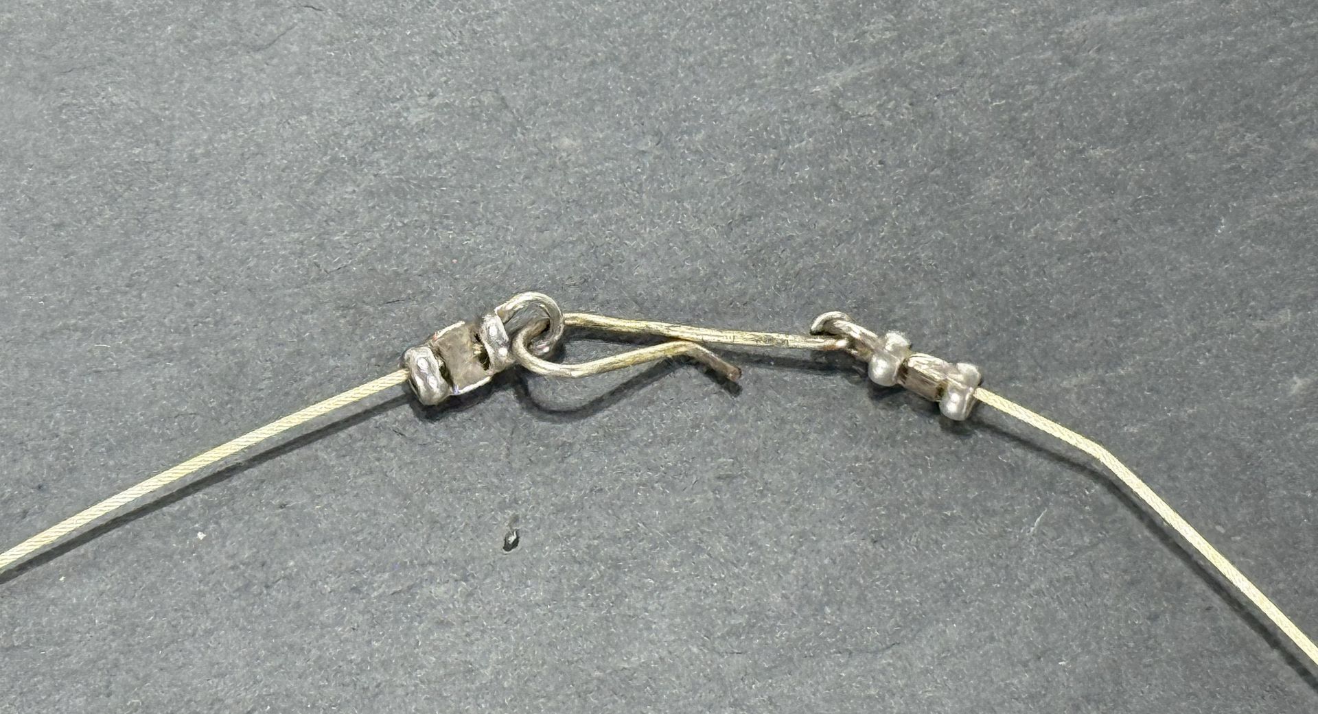 Sterling Silver Crimp with hand made with silver coated copper wire.