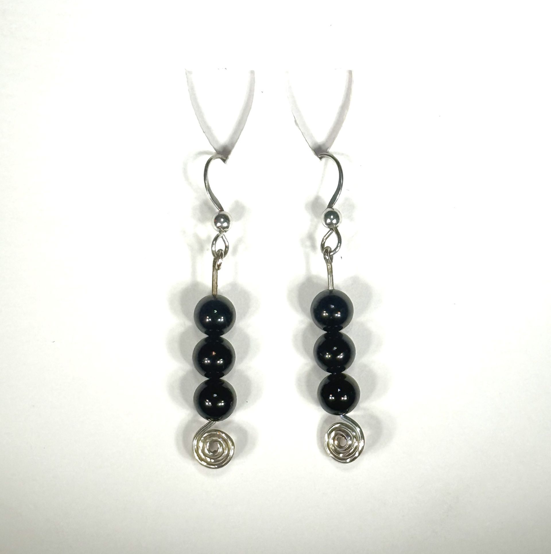 3 onyx beads on Stirling Silver Shepherds Crook ear wire