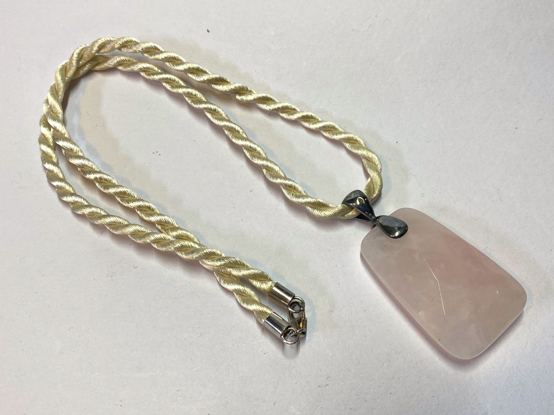 Rose Quartz shaped pendant on lovely cord with silver clasps