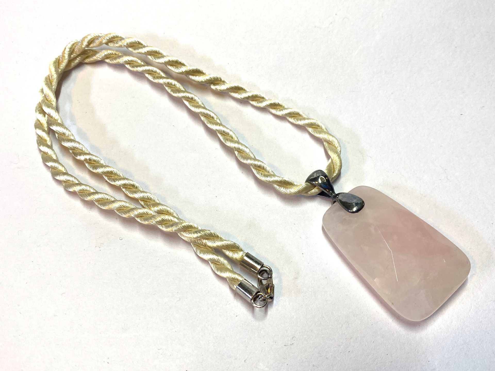 Rose Quartz shaped pendant on lovely satin cord with silver clasps