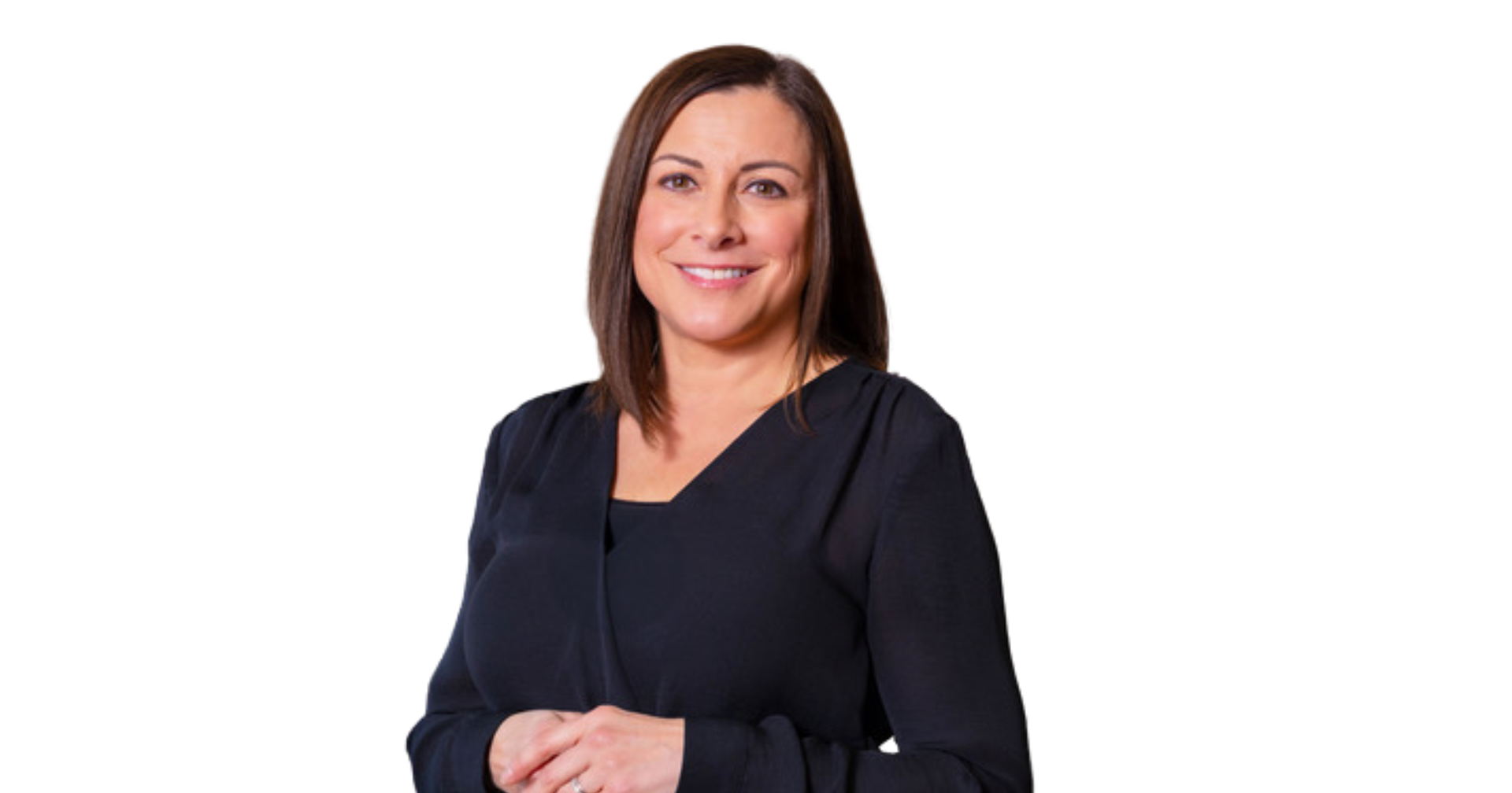 A man is sitting on a bicycle in front of a building.