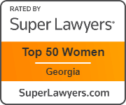 A badge that says `` rated by super lawyers top 50 women georgia ''.