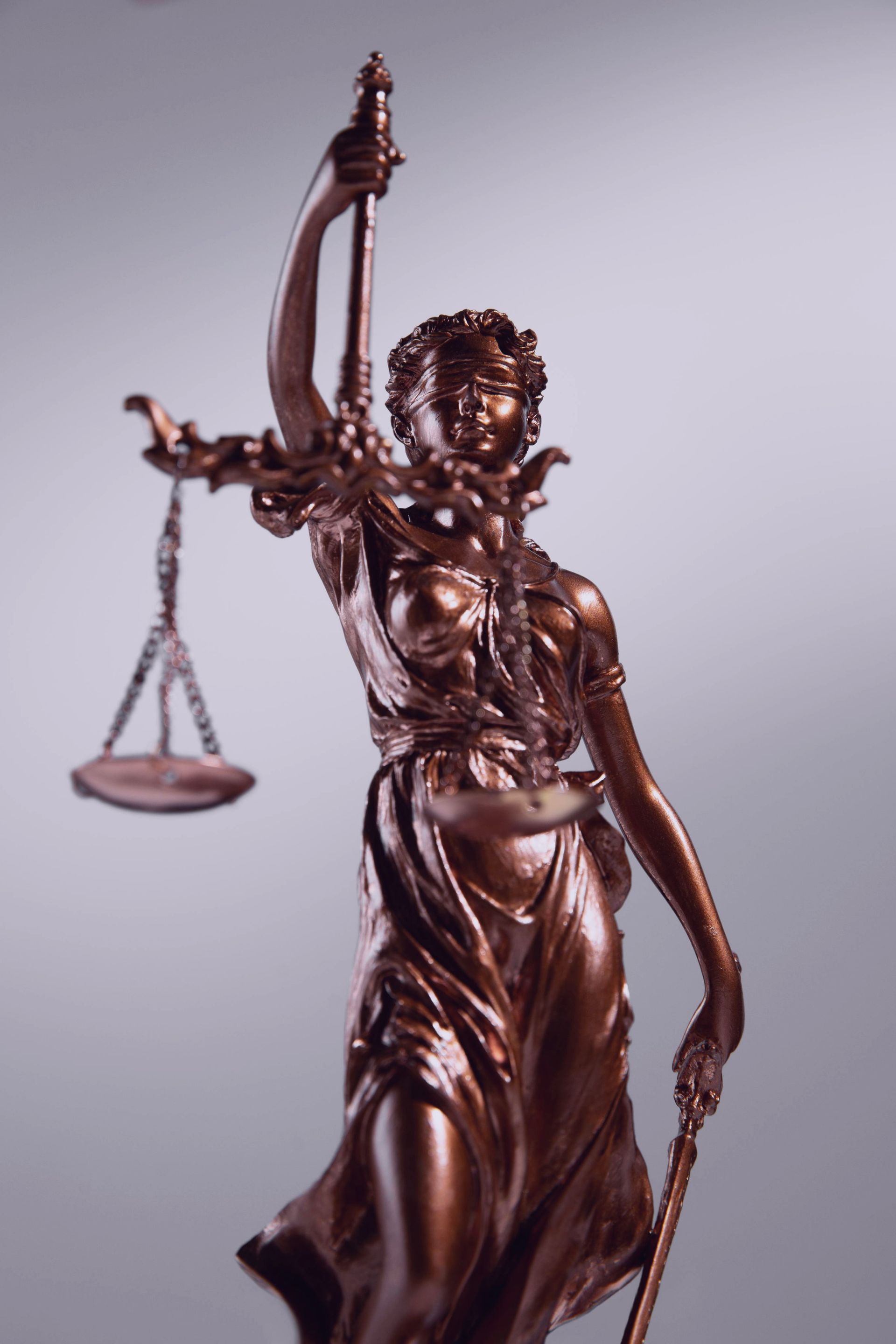 Bronze statue of Lady Justice holding scales, symbolizing fairness and law, used by an Atlanta personal injury attorney.