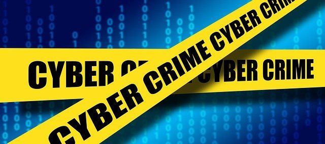 cyber crime yellow stips of text on a blue background