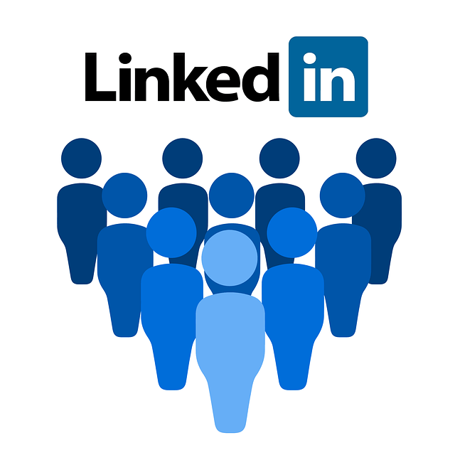 A group of people are standing in front of a linkedin logo