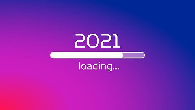 A loading bar for the year 2021 on a purple and pink background.