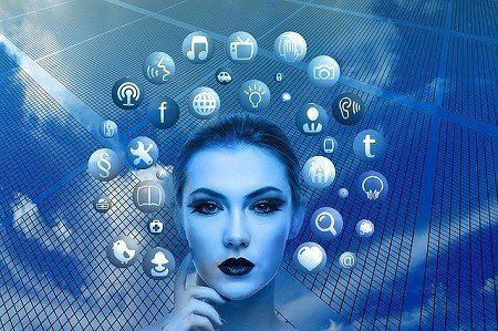 A woman 's face is surrounded by social media icons.