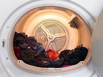 Clothes in a dryer — Whitegoods and air conditioners Central Coast in Port Macquarie, NSW