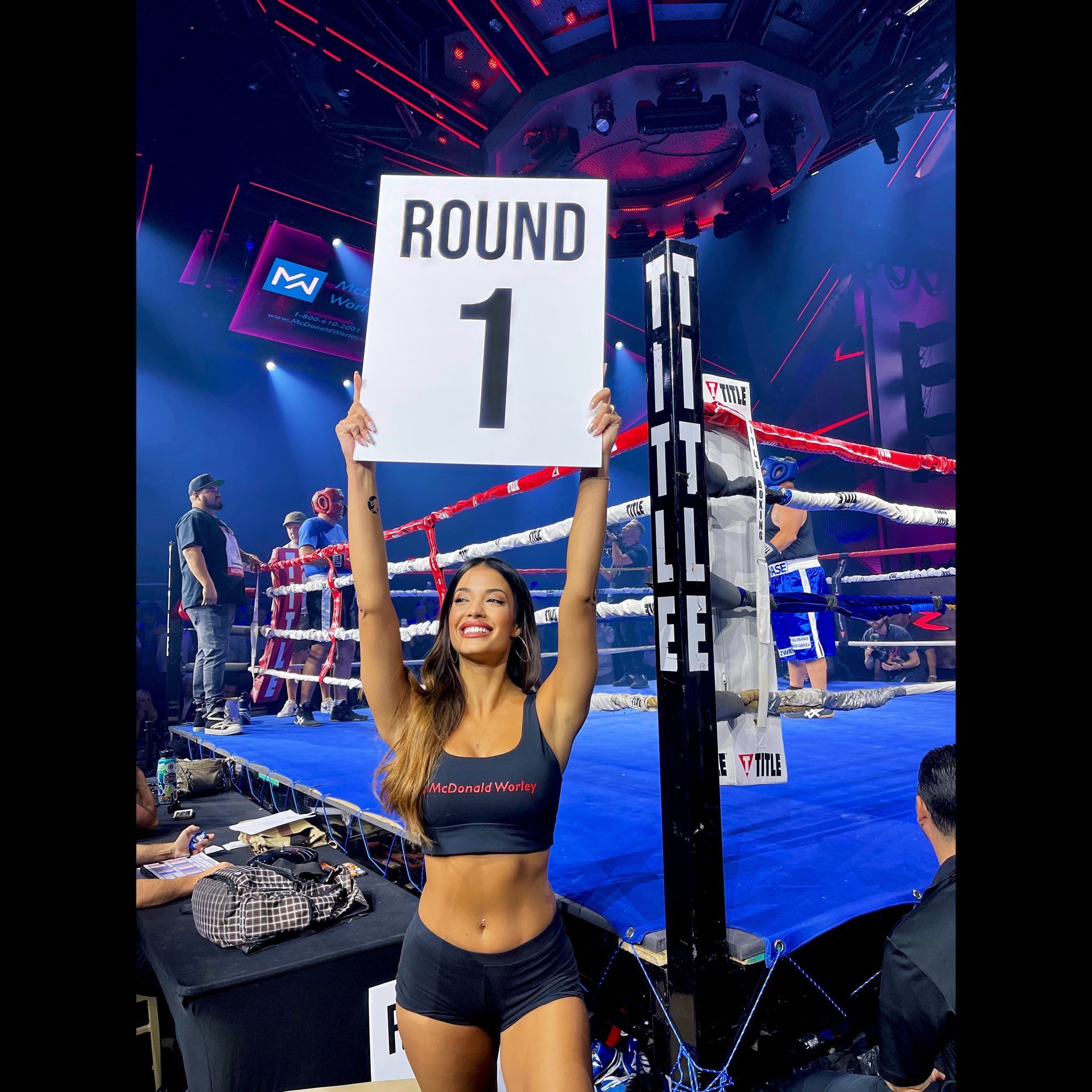 Stunning Las Vegas ring girl poses for cameras at corporate event at Zouk Nightclub, for Mass Torts conference in Las Vegas.