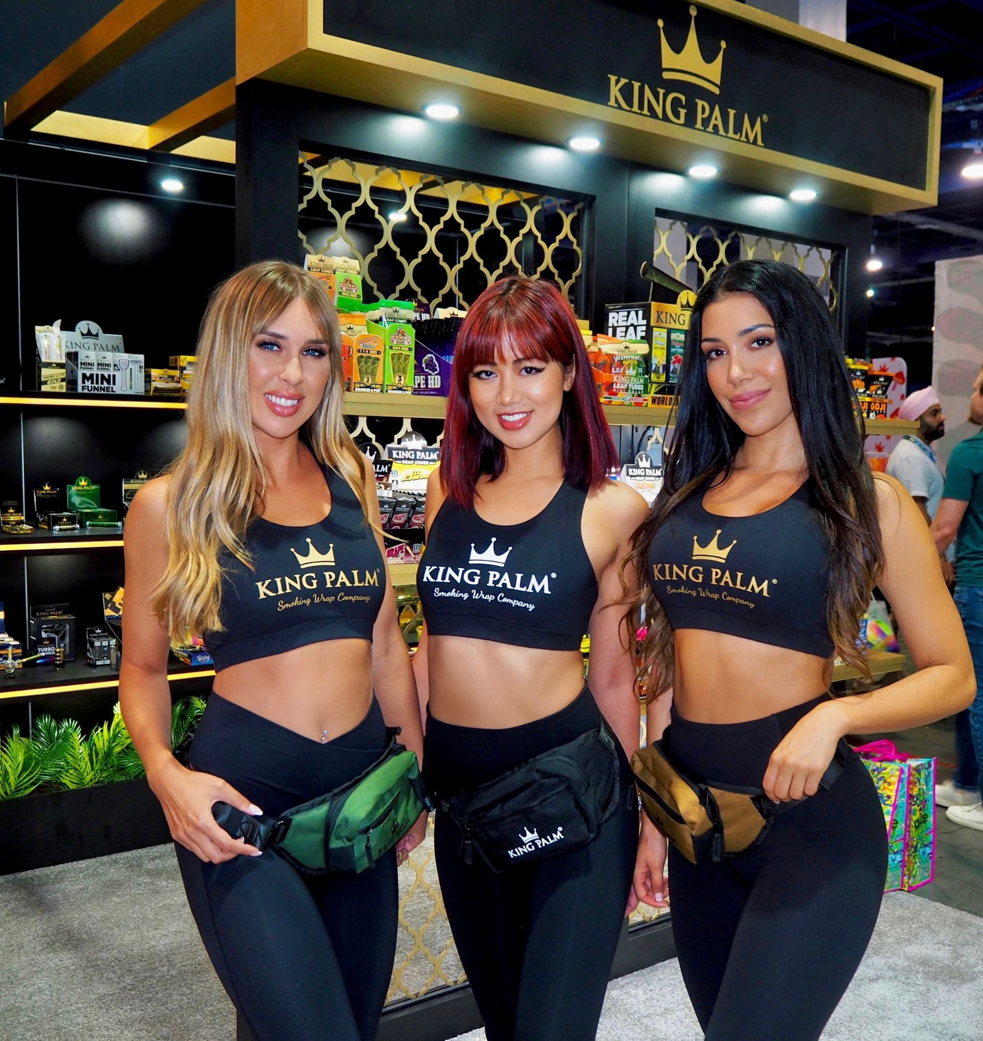 Promo models and booth hostesses in the King Palm booth at Champs Trade Show Las Vegas 2023.