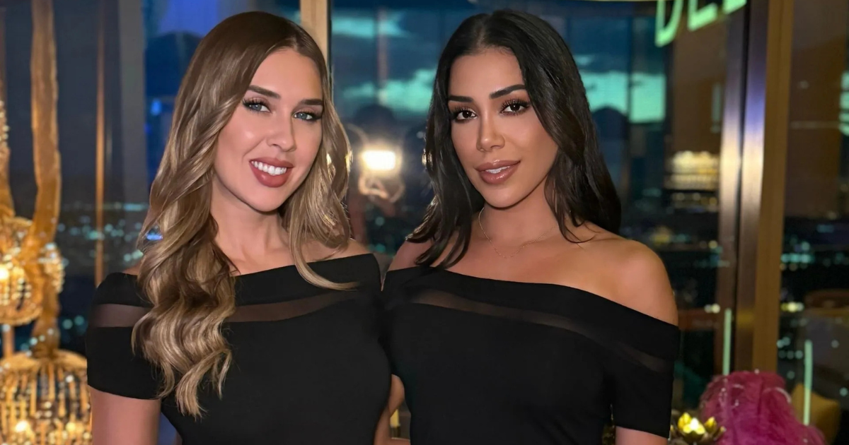 Two corporate hostesses in black dresses at a luxury Las Vegas event