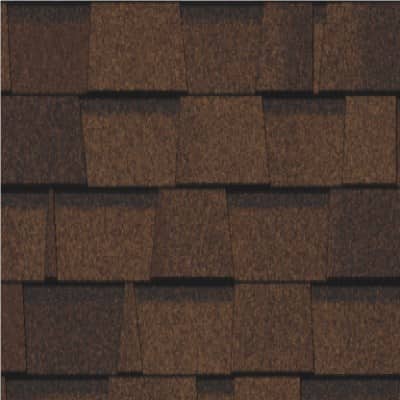 A close up of a brown shingle roof
