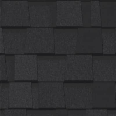 A close up of a black roof tile.