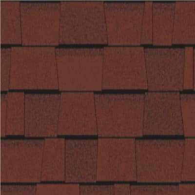 A close up of a red shingle roof