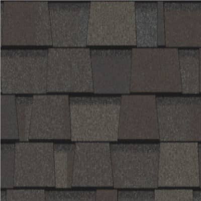 A close up of a roof with shingles on it.