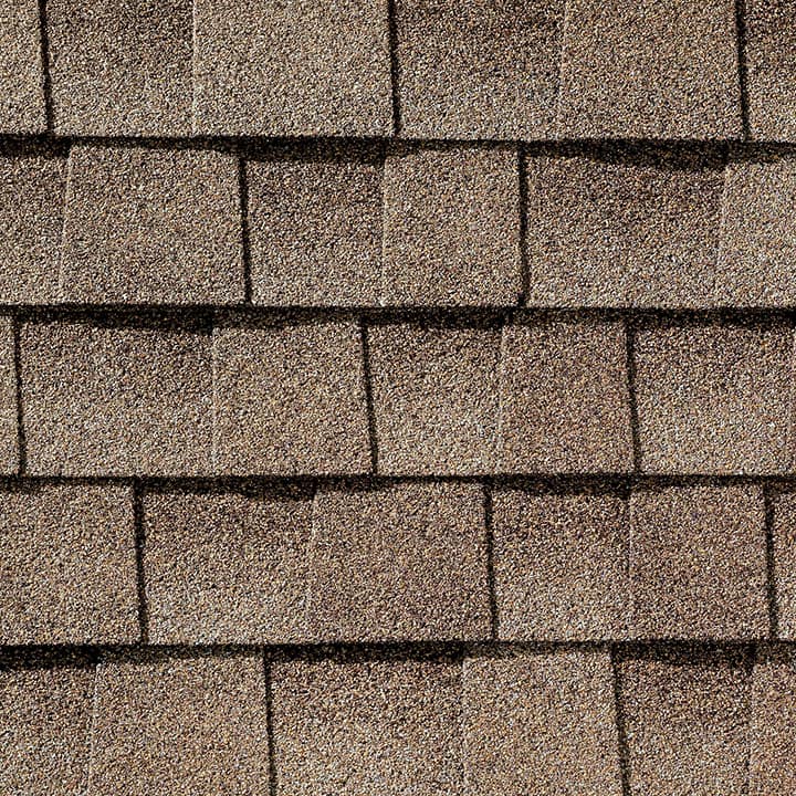 A close up of a roof with shingles on it.