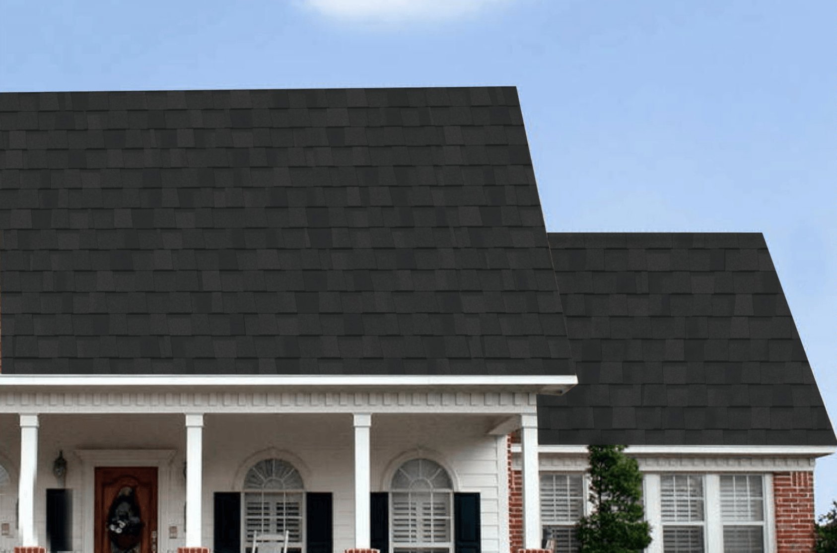 Flat Roof System near me. Image of house with black shingles