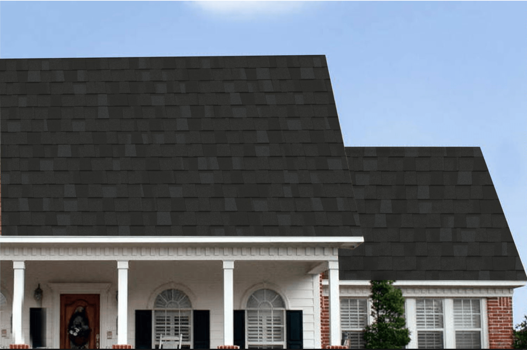 Best Asphalt shingles near me. A photo of a house with Max Def Charcoal Black shingles