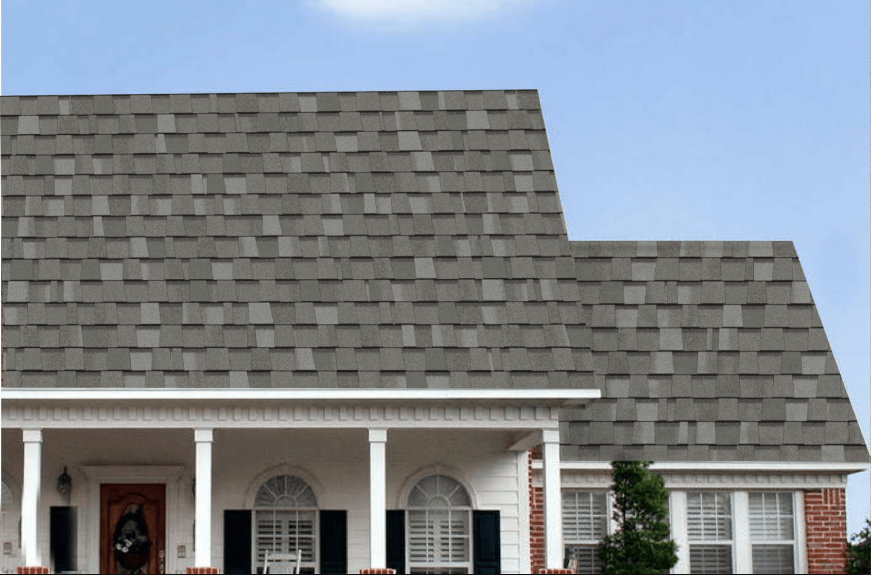 beast Asphalt shingles St. Pete. A photo of a house with Max Def Cobblestone Grey shingles