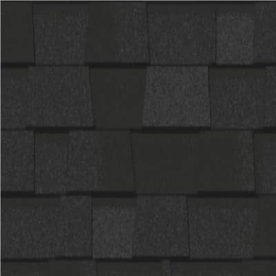 A close up of a black roof tile.
