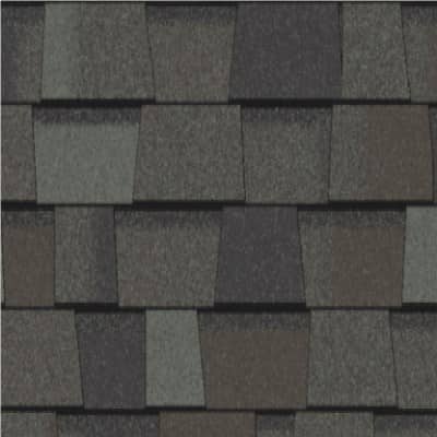 A close up of a roof with a lot of shingles