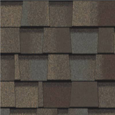 A close up of a roof with shingles on it