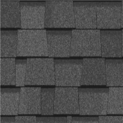 A close up of a roof with a lot of shingles on it.