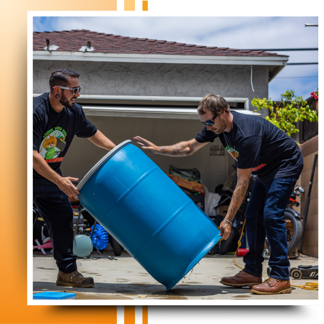 two men working to get rid of garbage