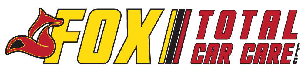 Logo of Fox Total Car Care. Red fox icon with black text and red text below, a car care service.